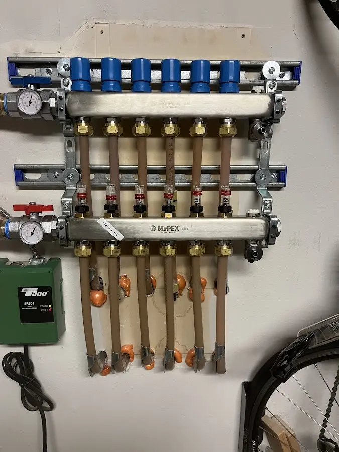 Plumber performing Water Heater Repair at a residential property in Seven Corners